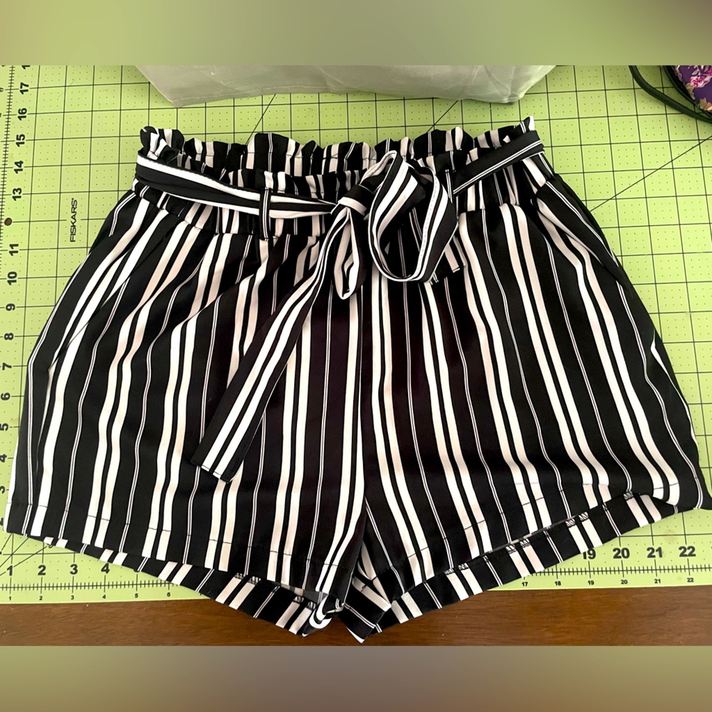 Black and white striped shorts with tie belt